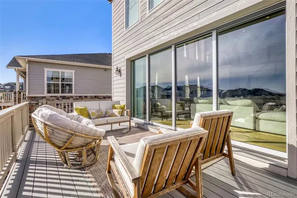 a view of balcony with furniture