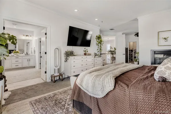 a bathroom with a bathtub shower sink and mirror