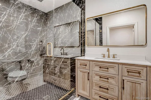 a bathroom with a sink and a toilet