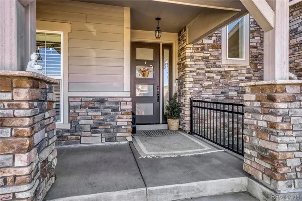 a view of a brick house with a street