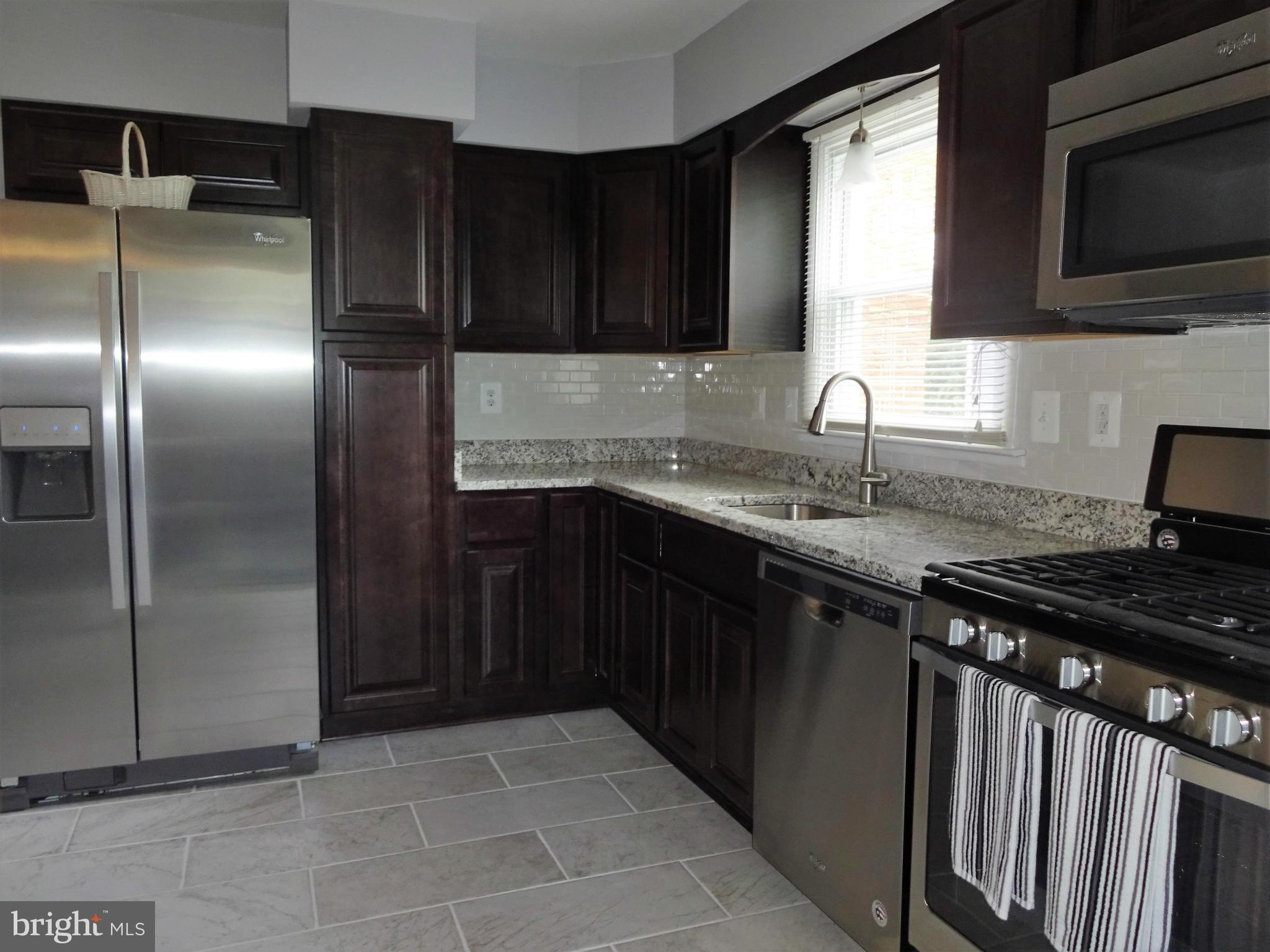 612 George Avenue Baltimore, MD 21221 - Photo 8 of 28 Pantry next to the Fridge
