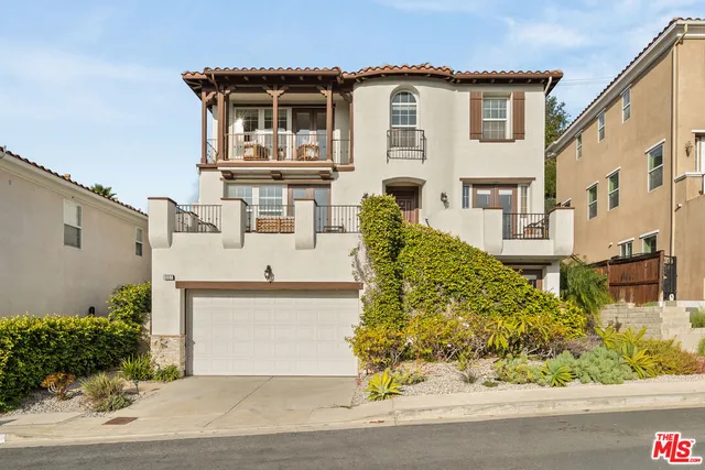 front view of a house with a street