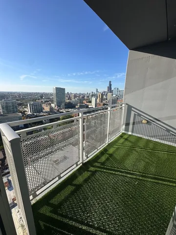a view of a balcony with an outdoor space
