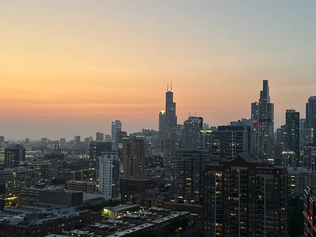 a view of a city with tall buildings
