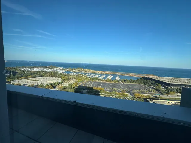 a view of an ocean from a balcony
