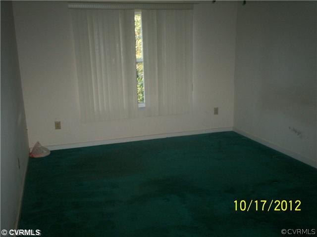 1320 Tree Ridge Road Henrico, VA 23231 - Photo 5 of 7 a view of an empty room and window