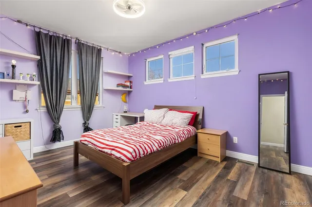 a view of residential house with outdoor space and seating area