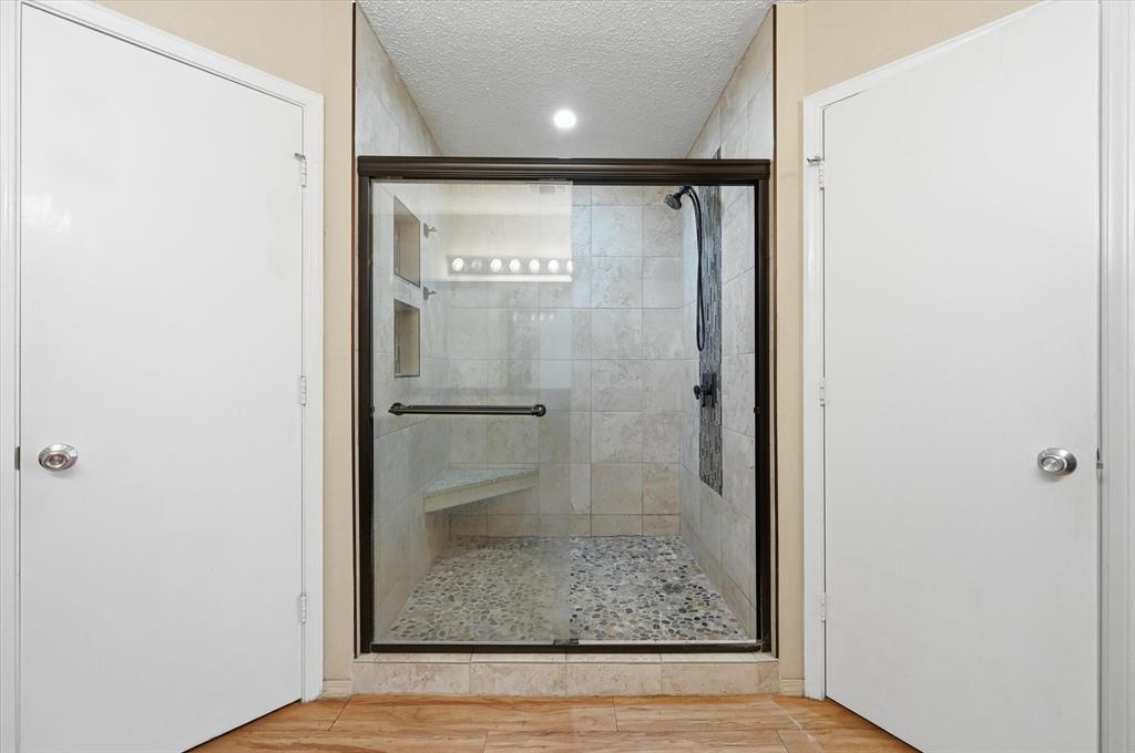 1503 North Fielder Road Arlington, TX 76012 - Photo 19 of 40 a bathroom with a shower