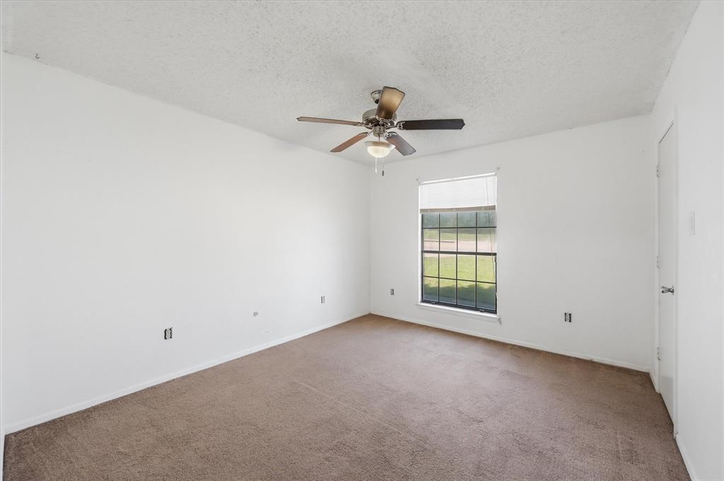1503 North Fielder Road Arlington, TX 76012 - Photo 32 of 40 a view of an empty room with a window