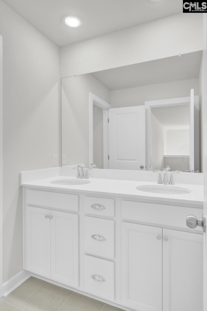 320 Brass Billion Path Lexington, SC 29073 - Photo 26 of 39 a bathroom with a sink and a mirror