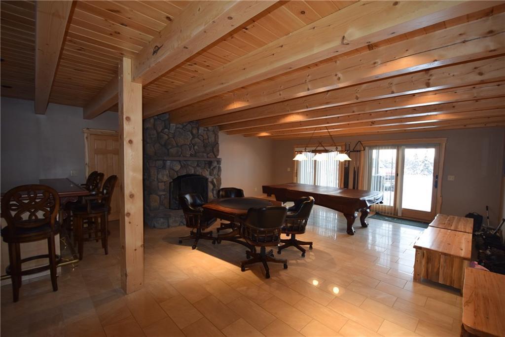 249 A Owlsboro Road Mount Chase, ME 04765 - Photo 21 of 35 Lower level family room with bar...