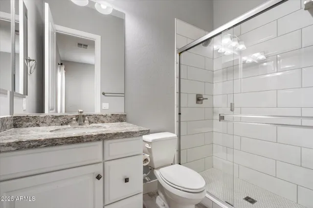 a utility room with sink dryer and washer