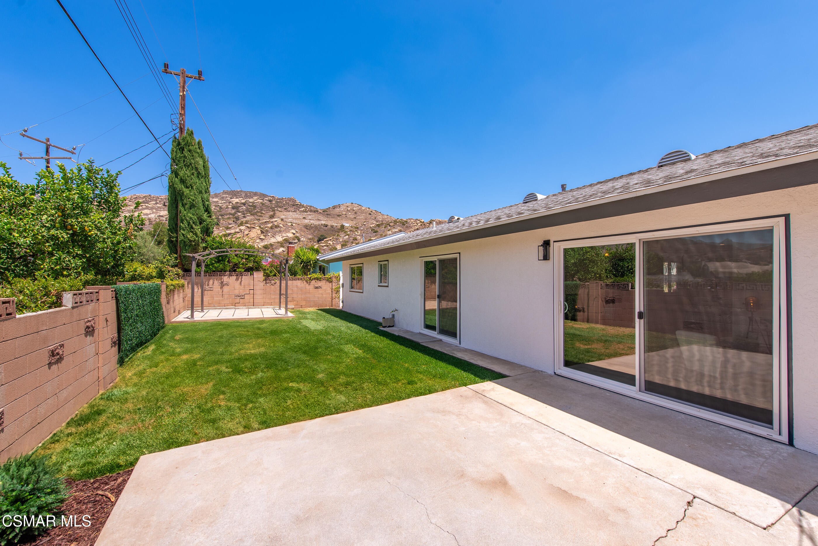 6669 Charing Street Simi Valley, CA 93063 - Photo 22 of 52 a view of a house with backyard and garden
