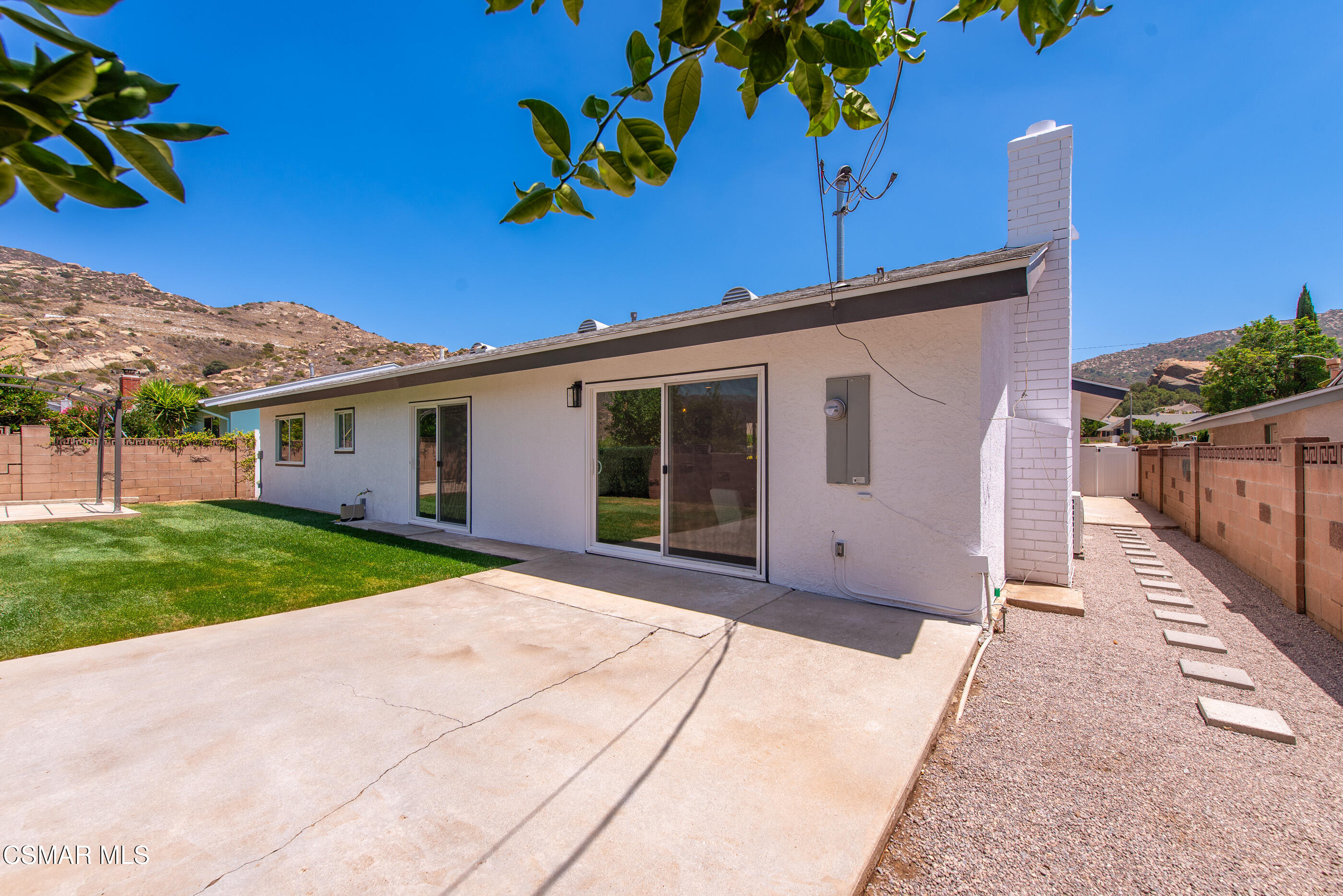 6669 Charing Street Simi Valley, CA 93063 - Photo 23 of 52 a view of a house with a backyard