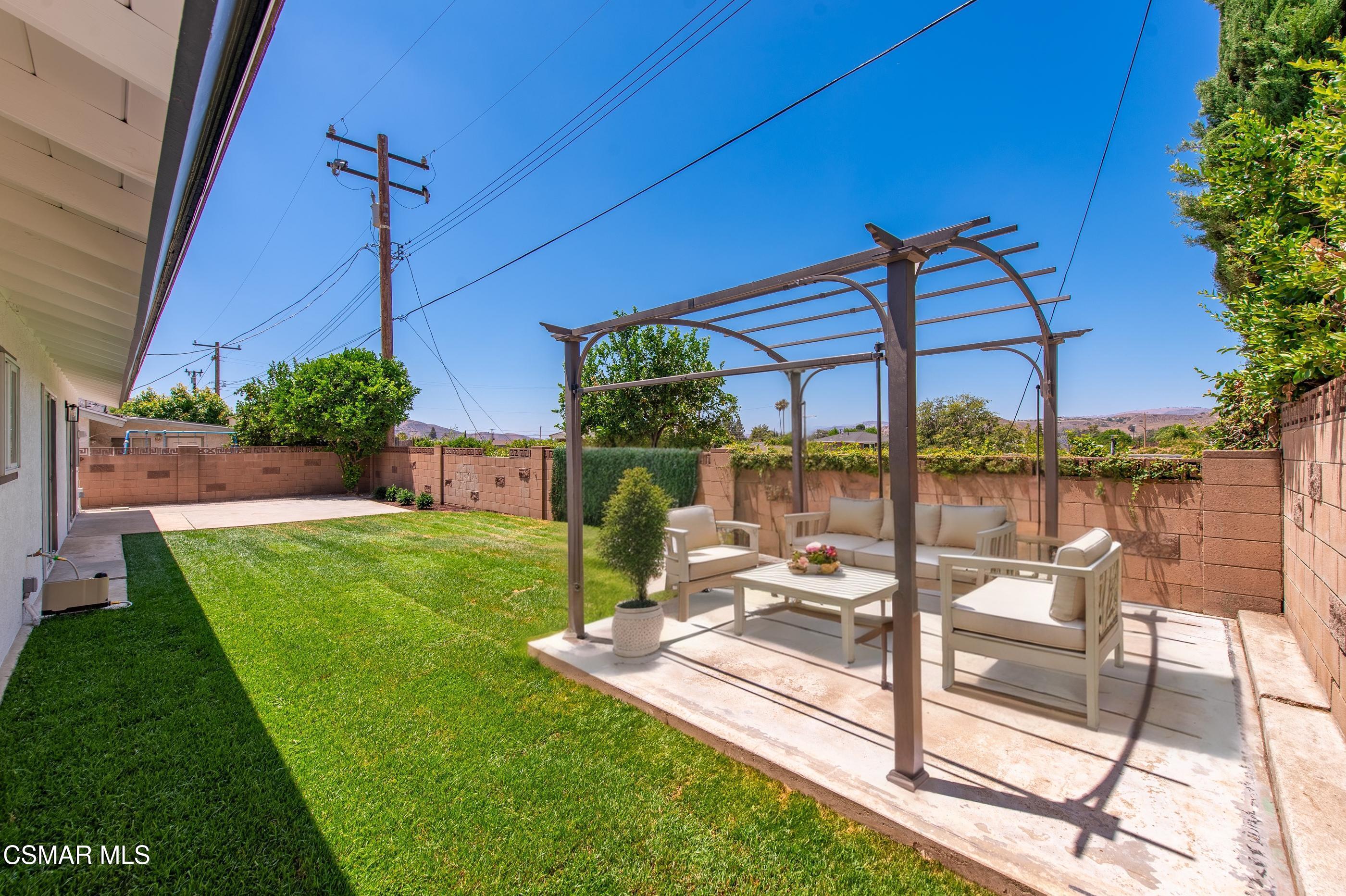 6669 Charing Street Simi Valley, CA 93063 - Photo 25 of 52 a view of a house with backyard and porch