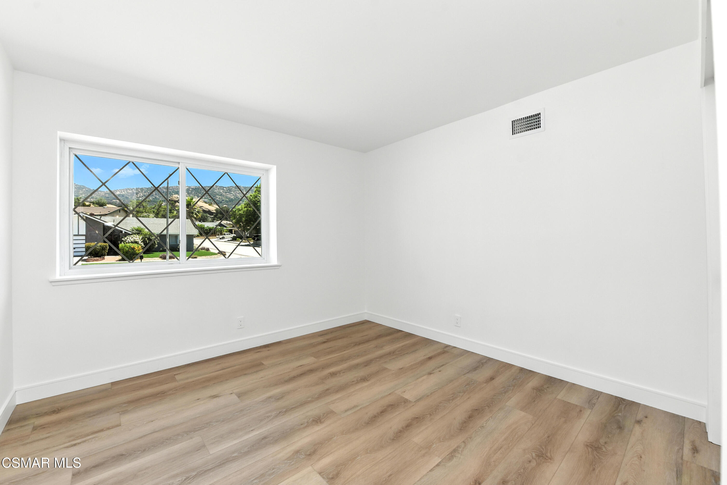 6669 Charing Street Simi Valley, CA 93063 - Photo 35 of 52 an empty room with a window