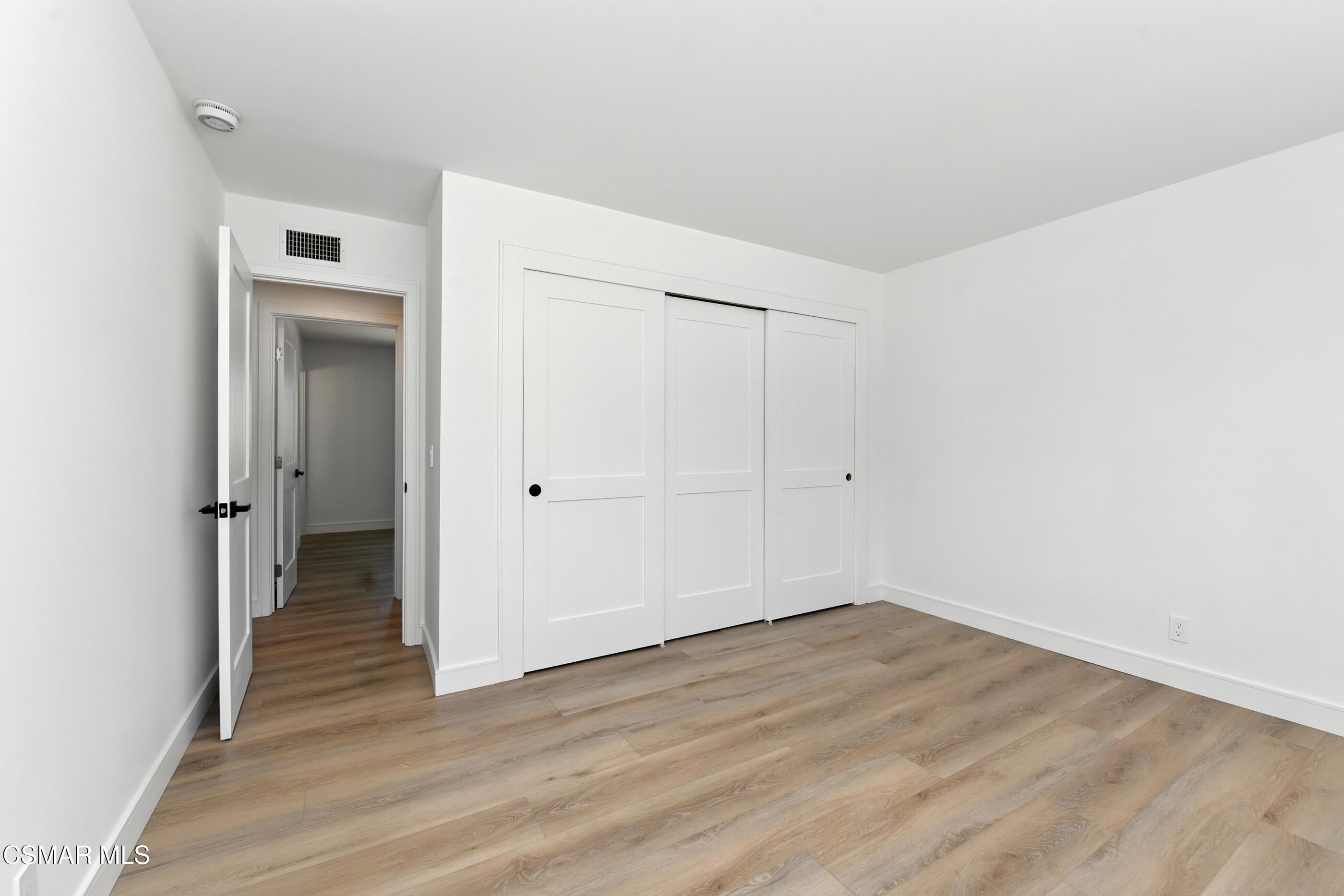6669 Charing Street Simi Valley, CA 93063 - Photo 39 of 52 a view of a room with wooden floor