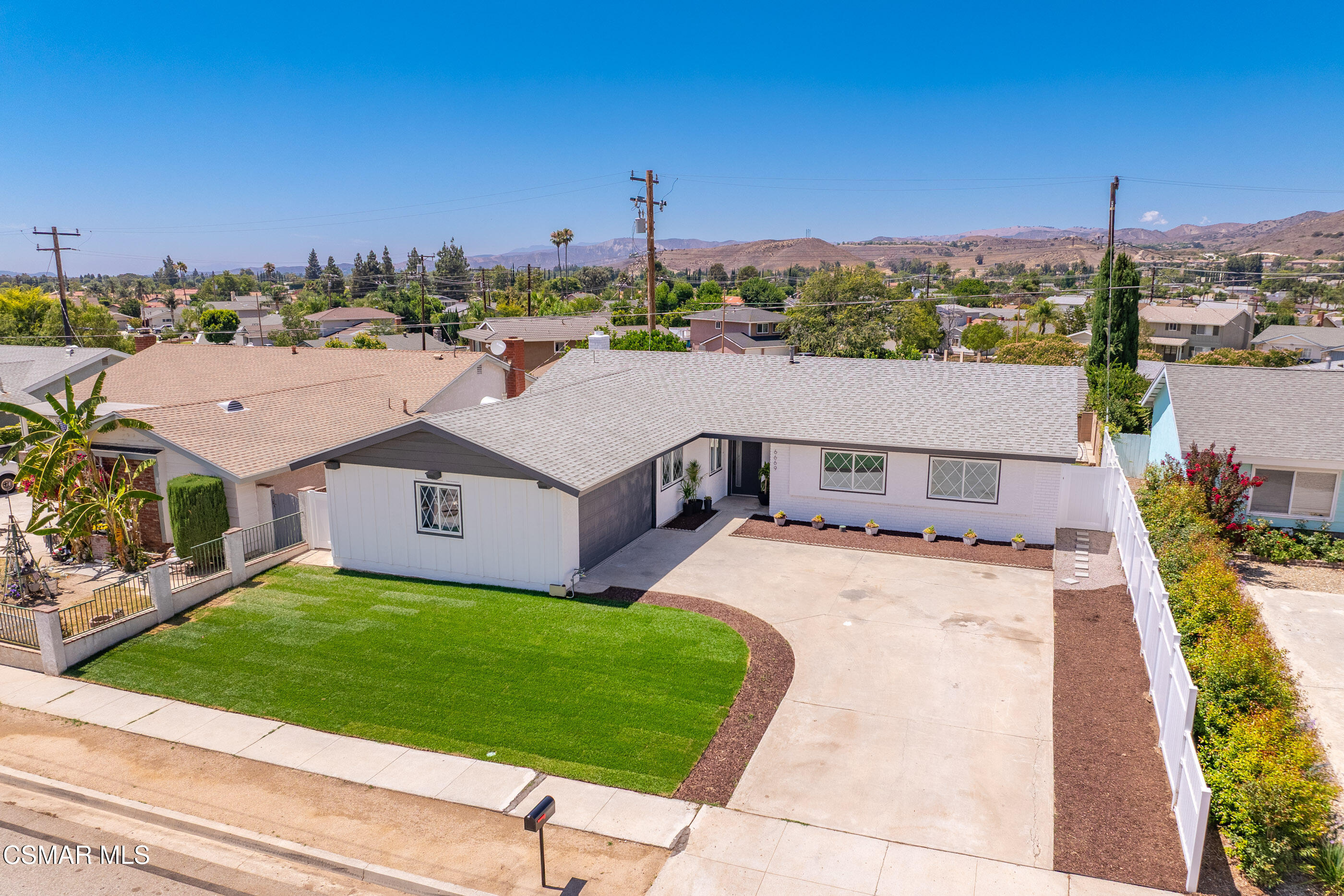 6669 Charing Street Simi Valley, CA 93063 - Photo 48 of 52 an aerial view of a house with a garden and houses