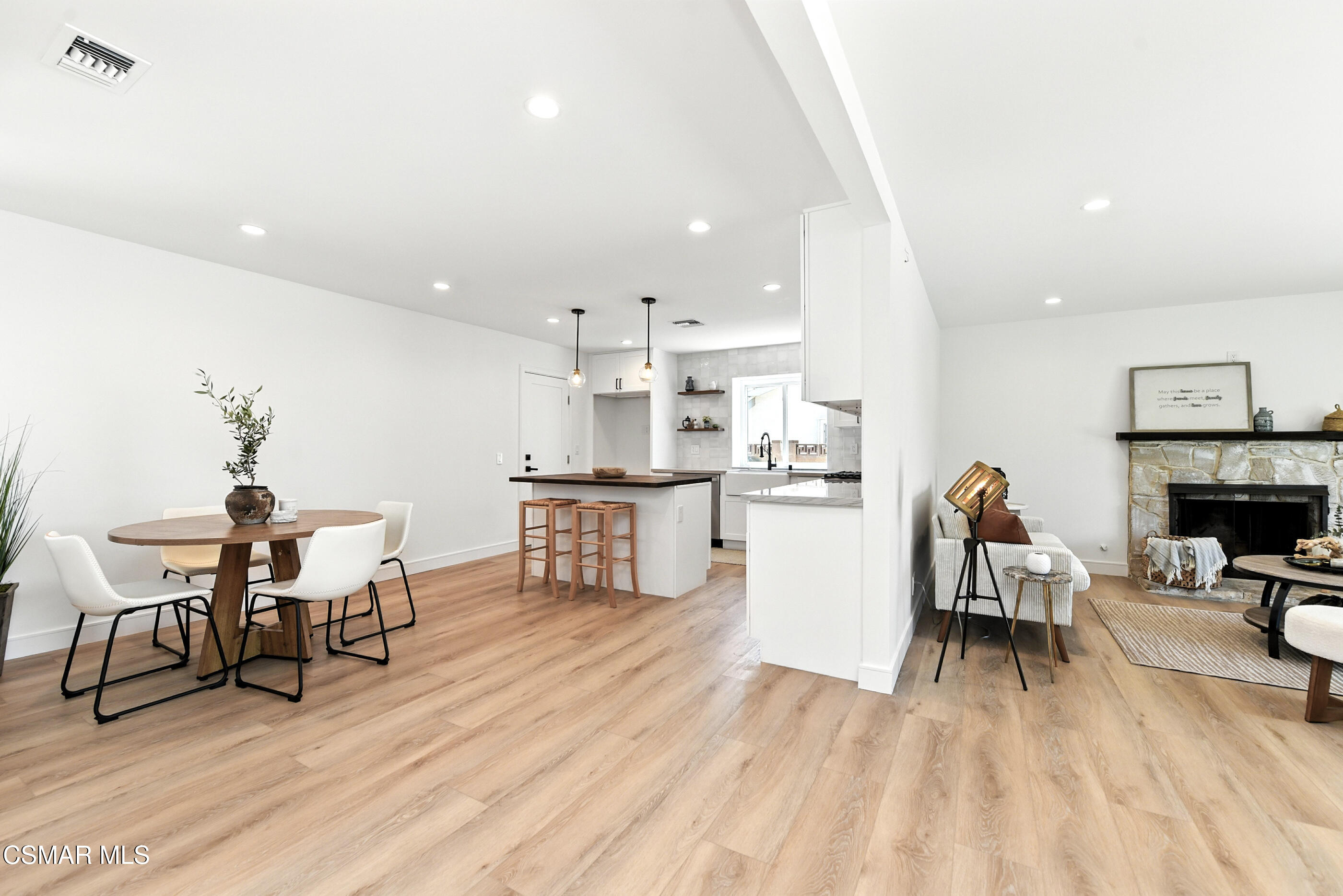 6669 Charing Street Simi Valley, CA 93063 - Photo 6 of 52 a living room with furniture and a wooden floor