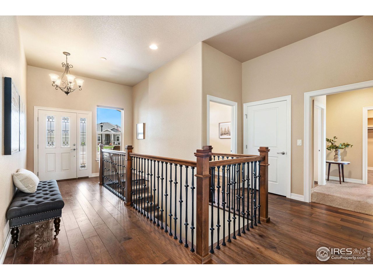 6740 Olympia Fields Court Windsor, CO 80550 - Photo 3 of 28 a view interior of a house with wooden floor