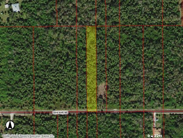 32nd Avenue Southeast Naples, FL 34120 - Photo 2 of 4 a view of a yard with a tree
