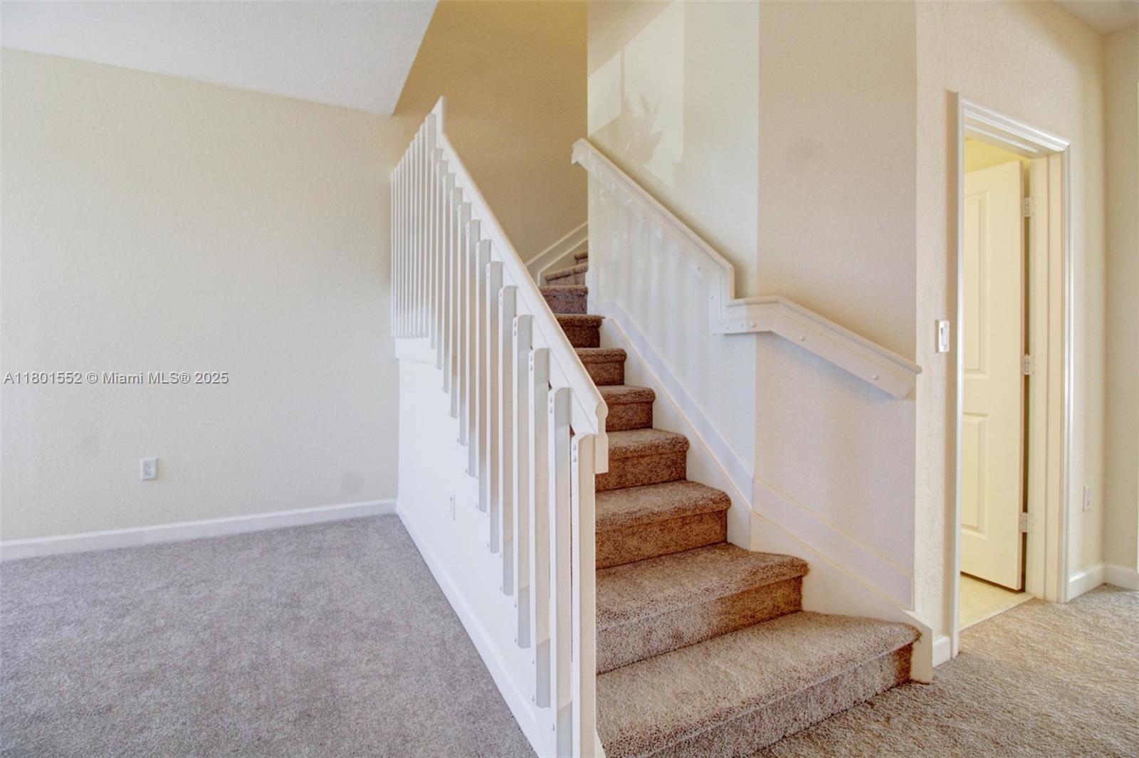 11094 West 33rd Way Hialeah, FL 33018 - Photo 17 of 46 a view of entryway and hall with wooden floor