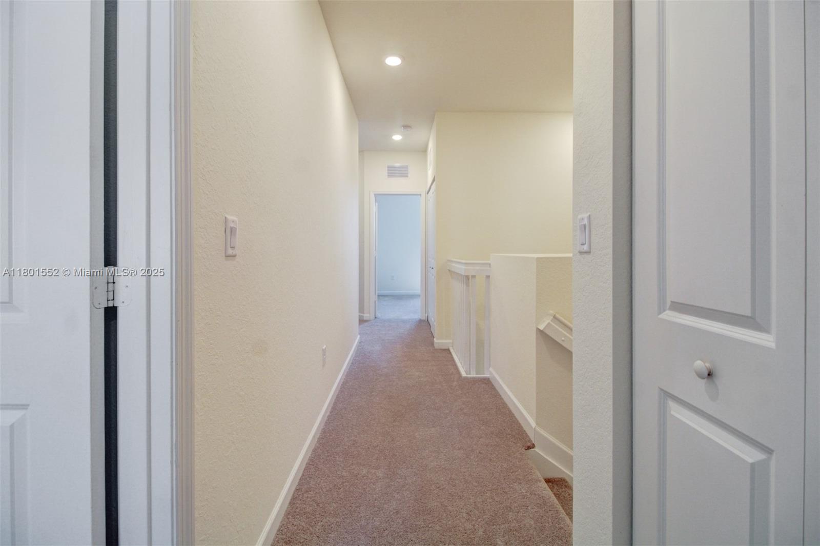 11094 West 33rd Way Hialeah, FL 33018 - Photo 18 of 46 a view of a hallway with wooden floor