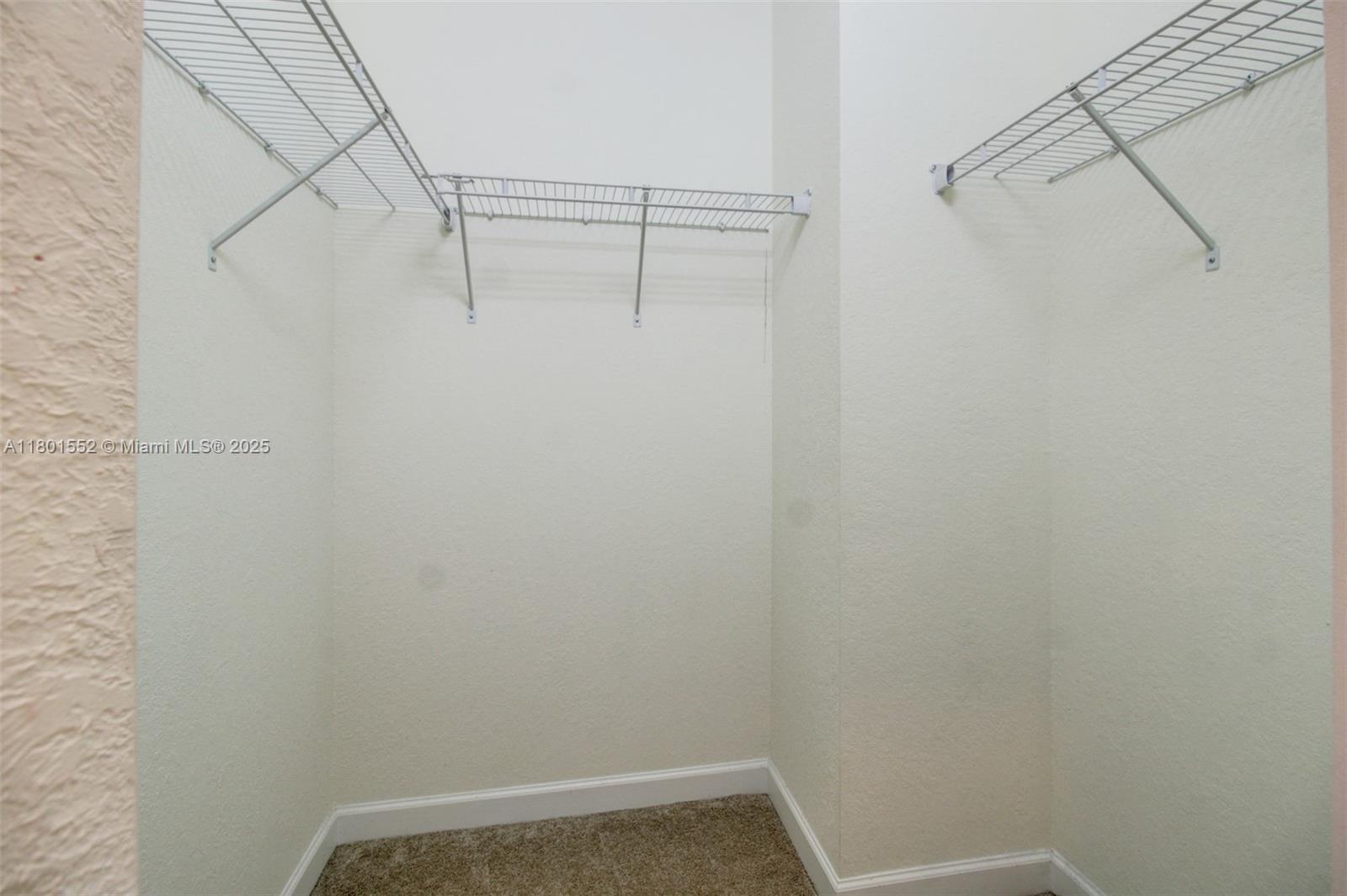 11094 West 33rd Way Hialeah, FL 33018 - Photo 22 of 46 a view of small space with racks on the wall