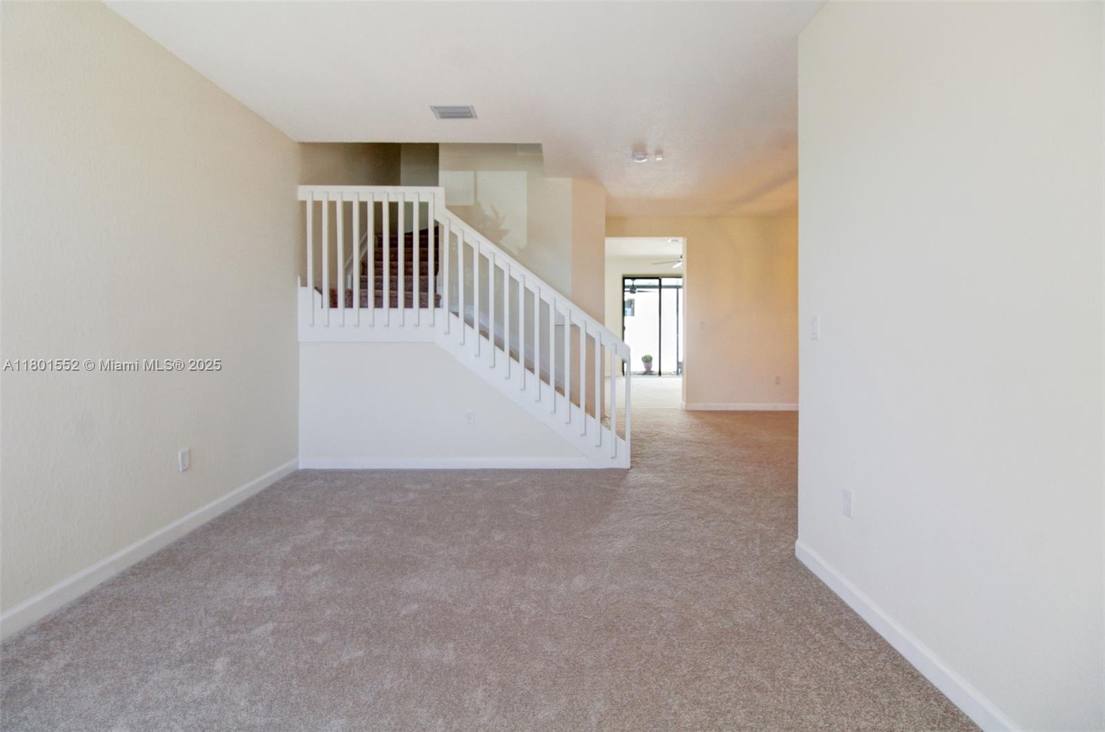 11094 West 33rd Way Hialeah, FL 33018 - Photo 3 of 46 a view of a hallway with staircase