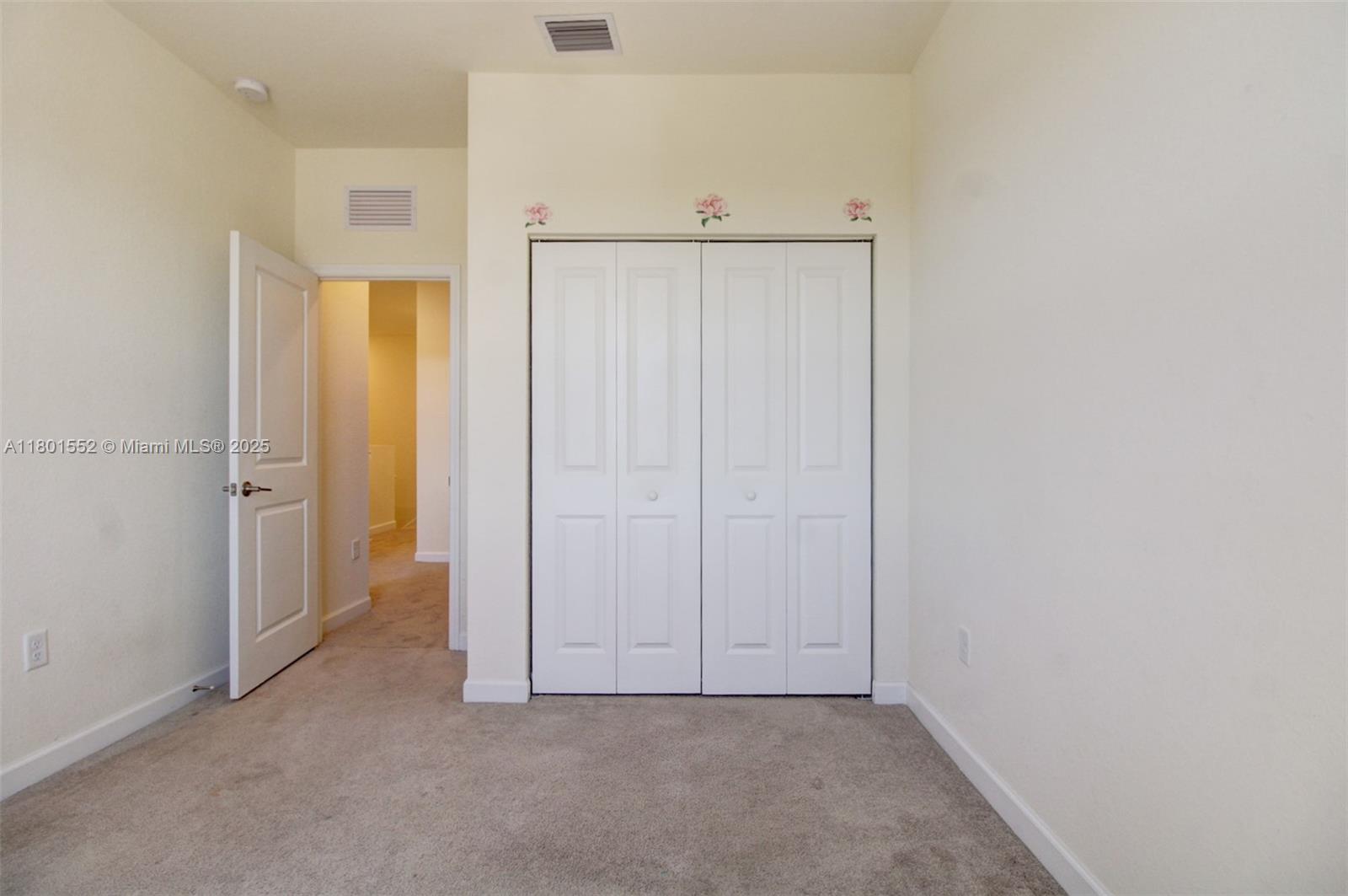 11094 West 33rd Way Hialeah, FL 33018 - Photo 36 of 46 an empty room with closet area