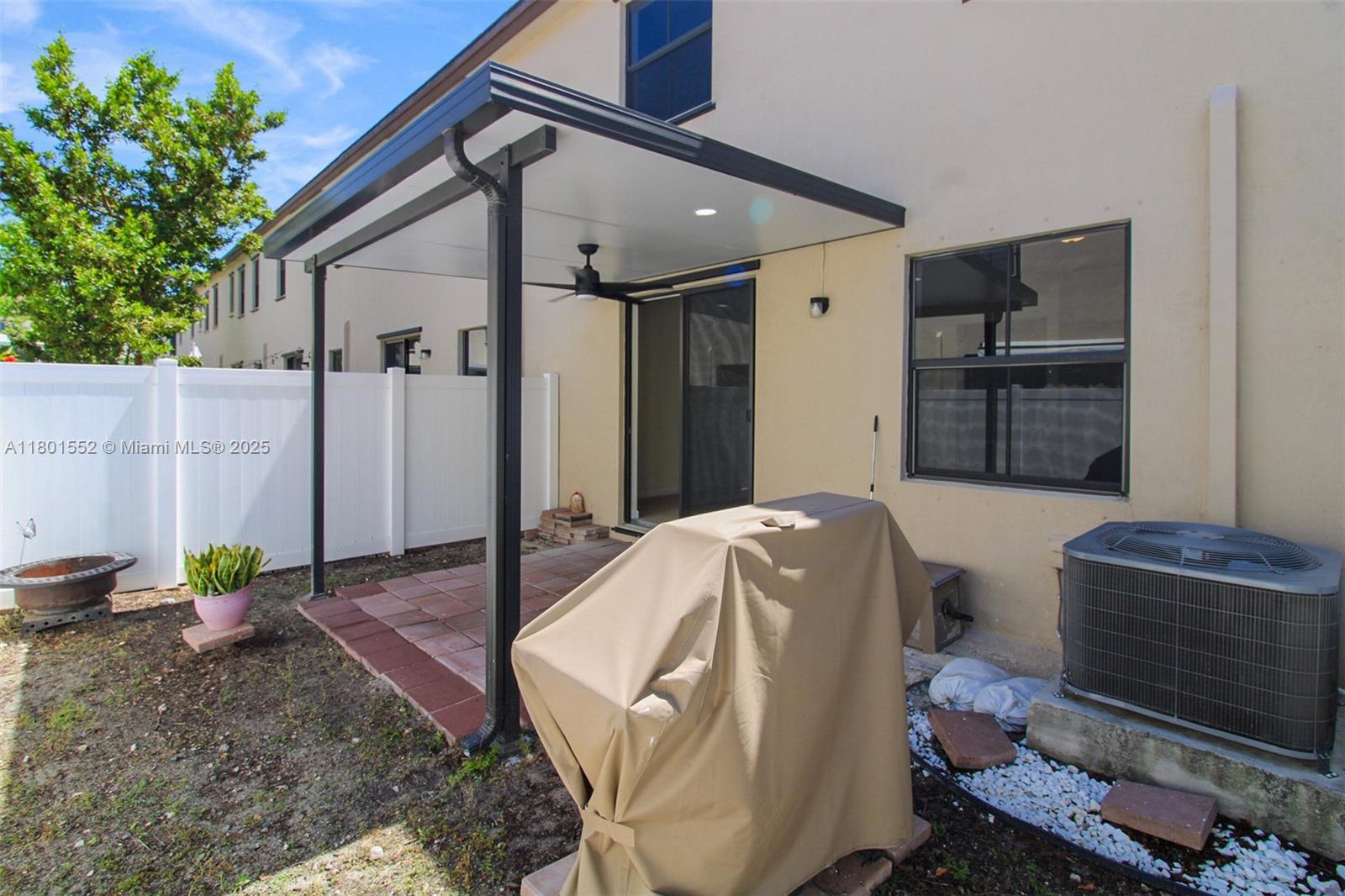 11094 West 33rd Way Hialeah, FL 33018 - Photo 39 of 46 a house view with a backyard space