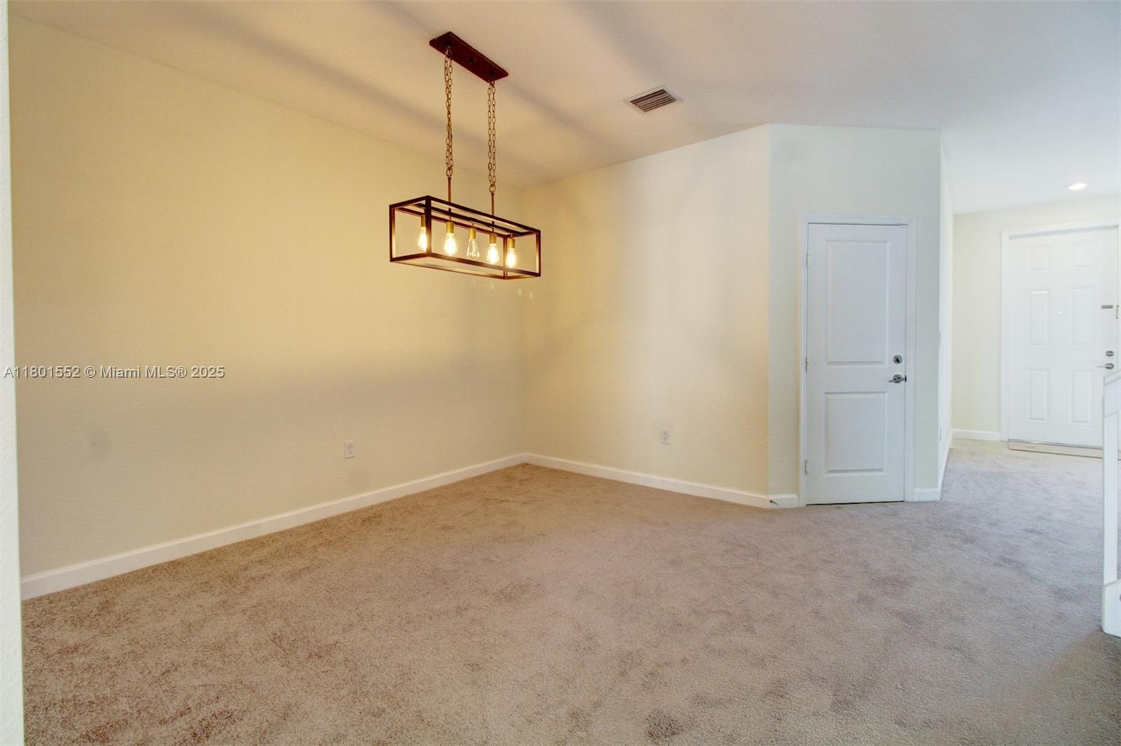 11094 West 33rd Way Hialeah, FL 33018 - Photo 6 of 46 a view of empty room with ceiling fan