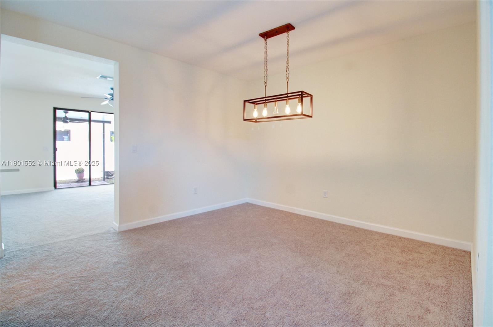 11094 West 33rd Way Hialeah, FL 33018 - Photo 8 of 46 a view of empty room with windows