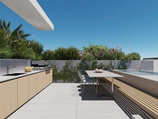 a view of a back yard from a balcony