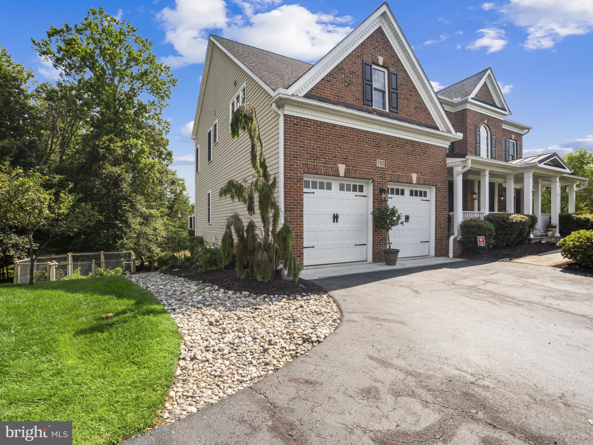 733 Seneca Drive Odenton, MD 21113 - Photo 18 of 83 Stone Patio off Garage leads to Fenced Garden