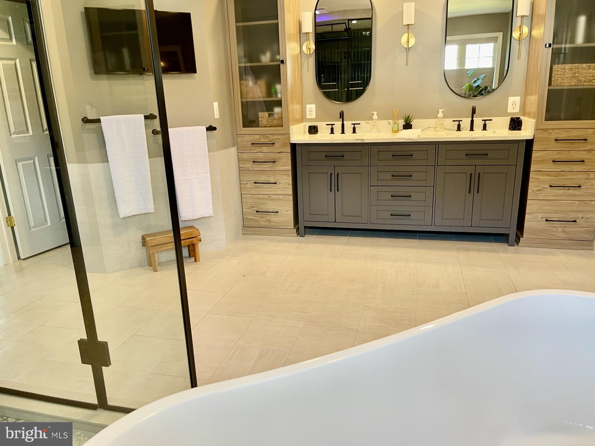 733 Seneca Drive Odenton, MD 21113 - Photo 36 of 83 a bathroom with double vanity sink and mirror