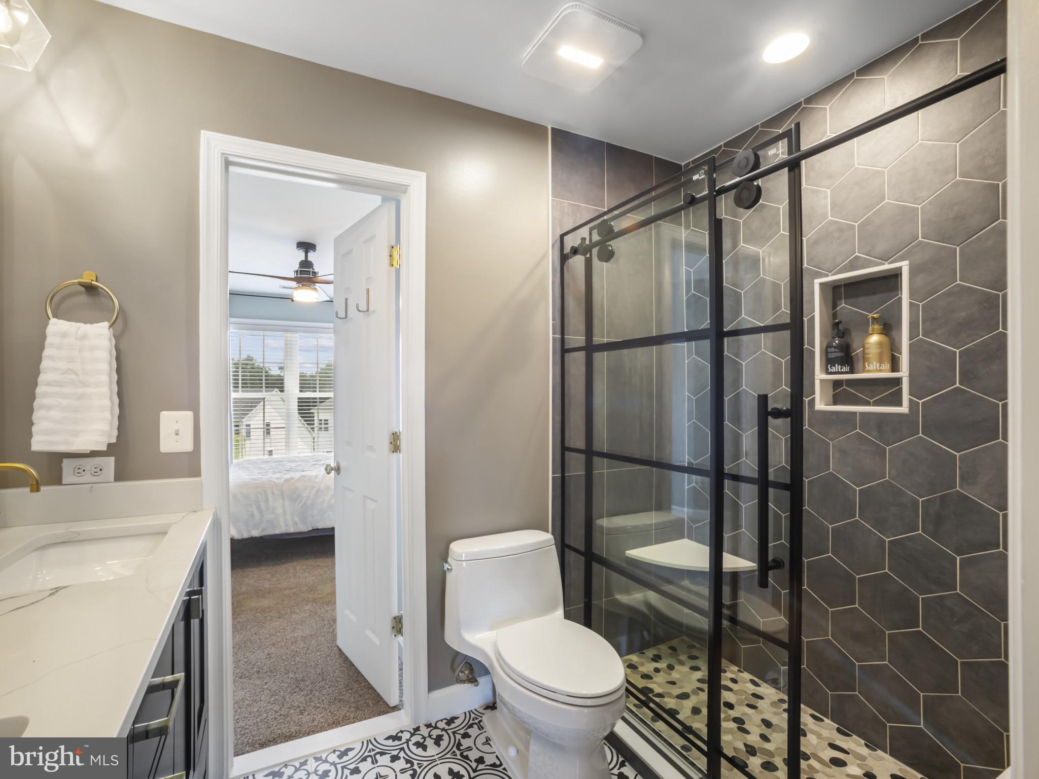 733 Seneca Drive Odenton, MD 21113 - Photo 43 of 83 a bathroom with a shower toilet and sink