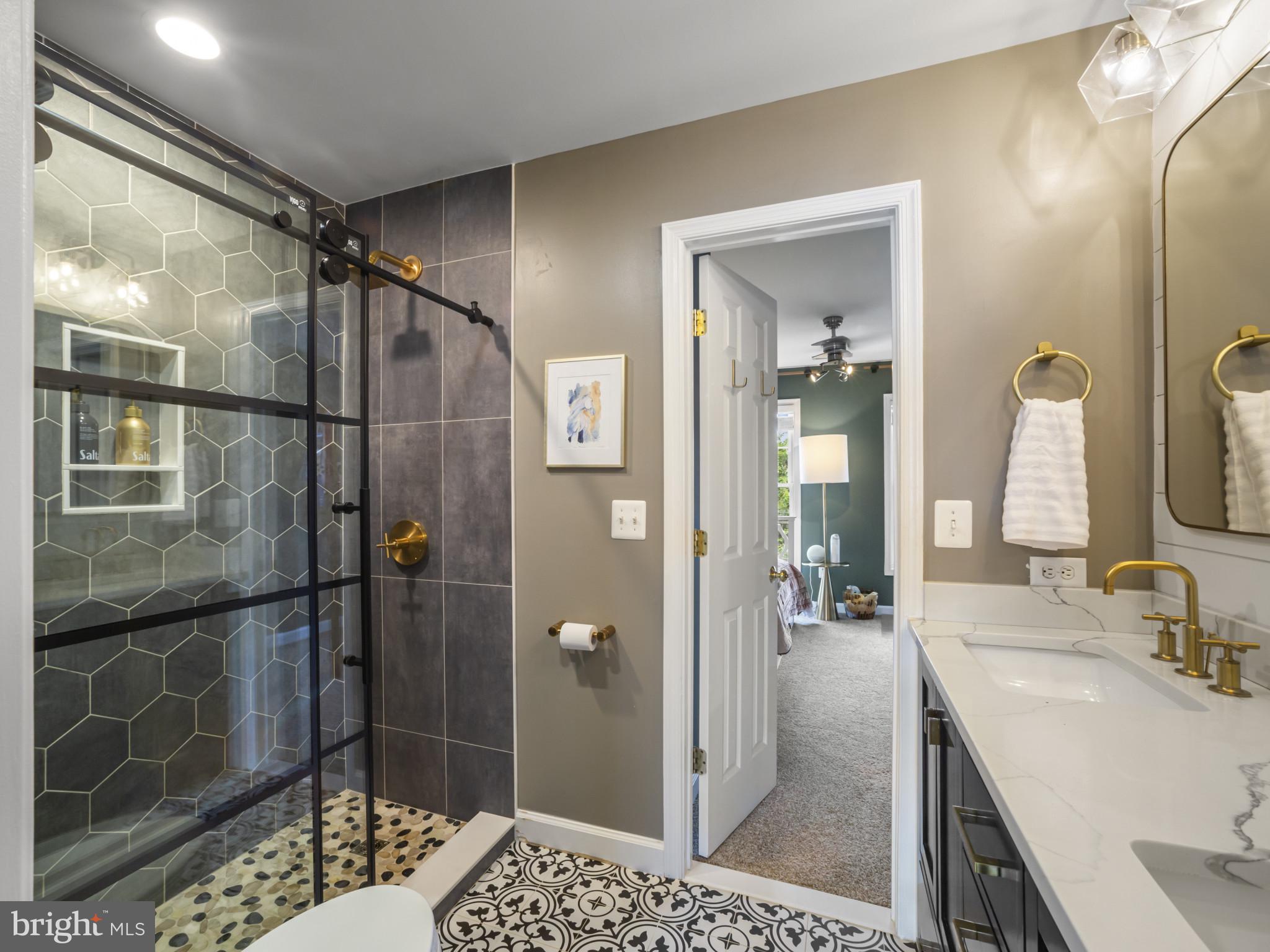 733 Seneca Drive Odenton, MD 21113 - Photo 44 of 83 a bathroom with a sink and shower