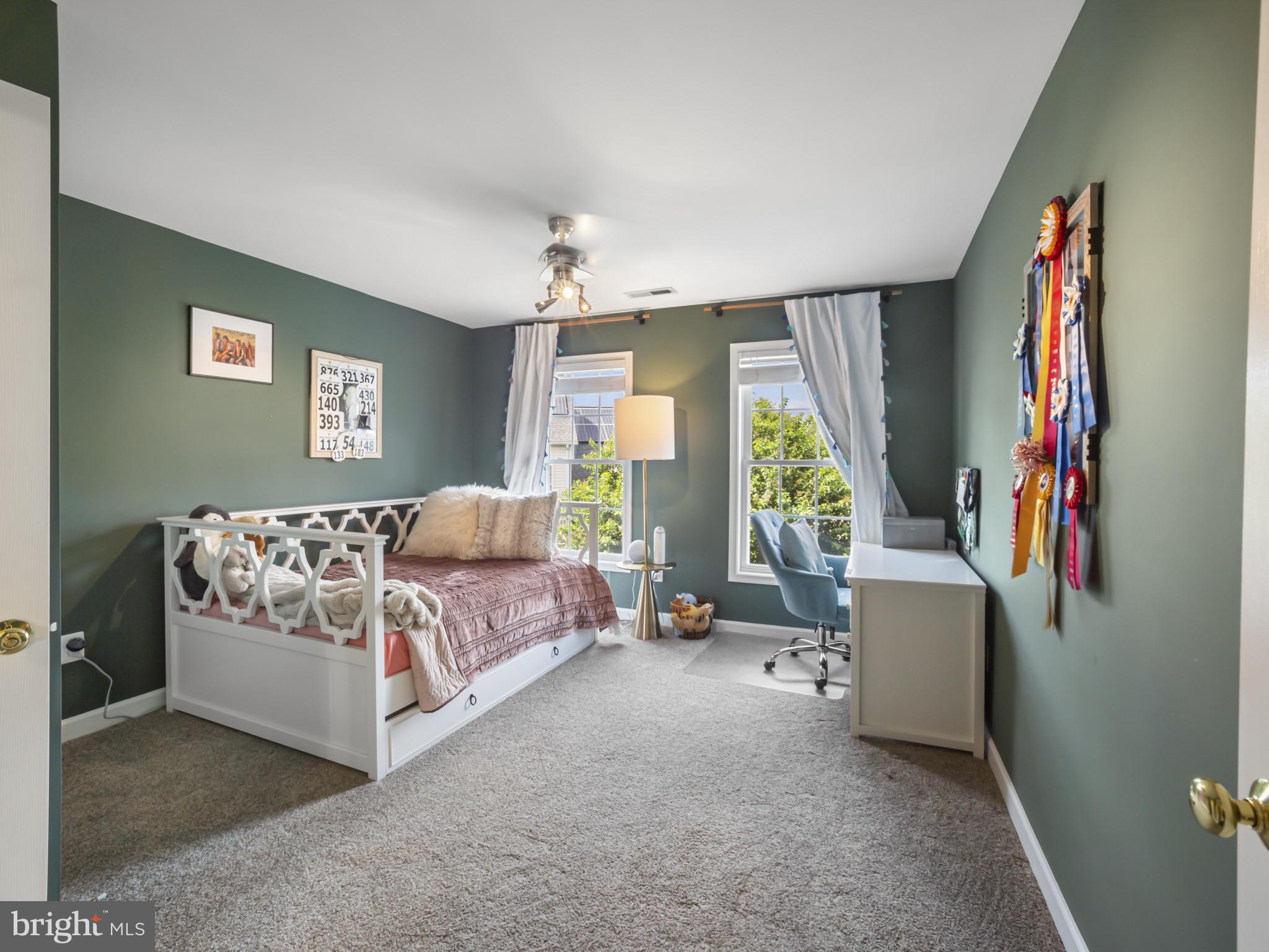 733 Seneca Drive Odenton, MD 21113 - Photo 46 of 83 a bed room with a bed and a couch