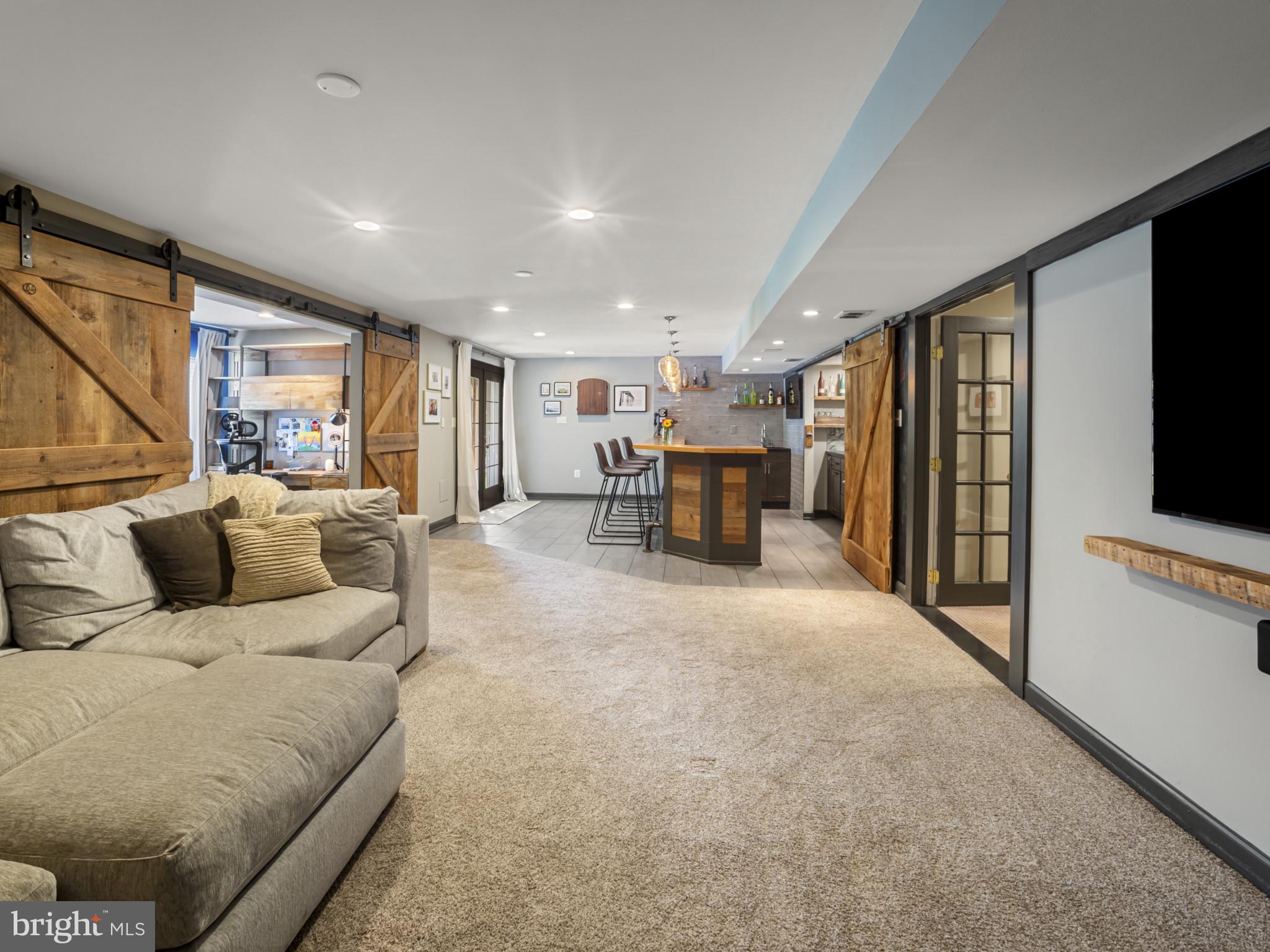 733 Seneca Drive Odenton, MD 21113 - Photo 54 of 83 a living room with furniture and a flat screen tv