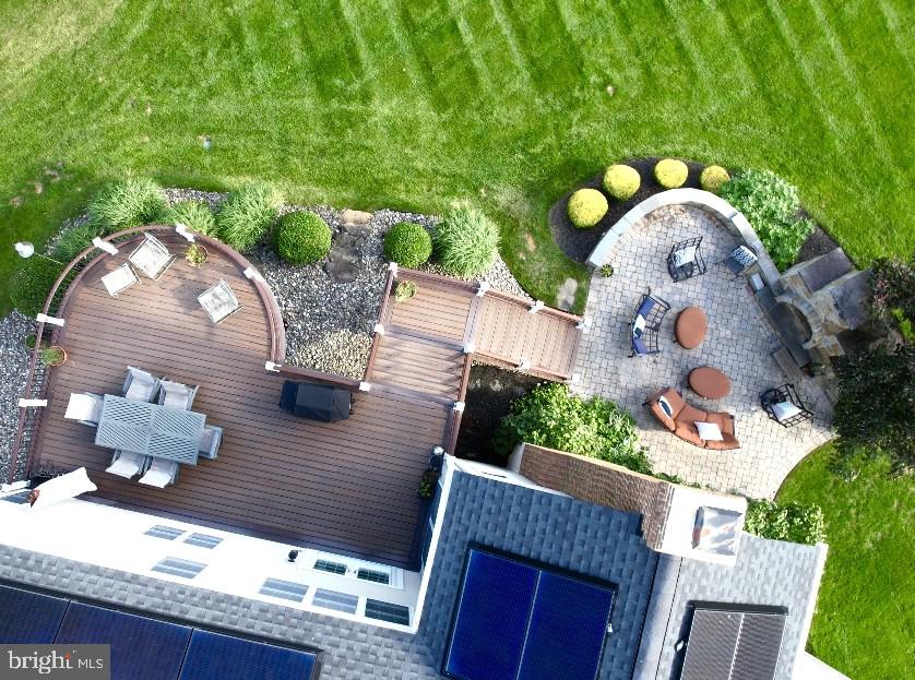 733 Seneca Drive Odenton, MD 21113 - Photo 68 of 83 a front view of a house with a garden and chairs