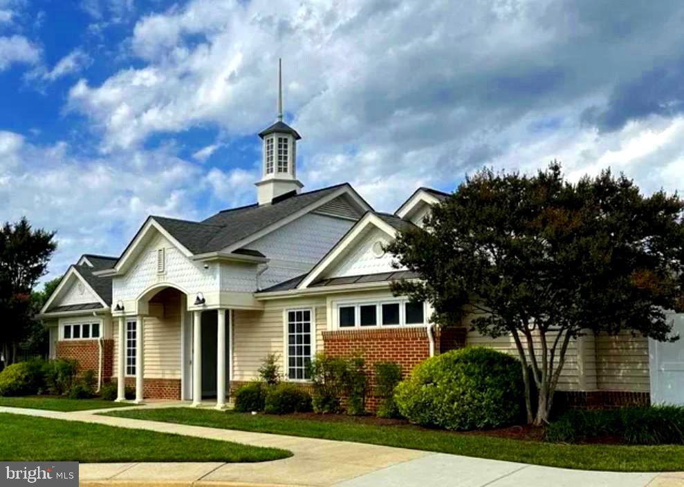 733 Seneca Drive Odenton, MD 21113 - Photo 76 of 83 a front view of a house with a garden