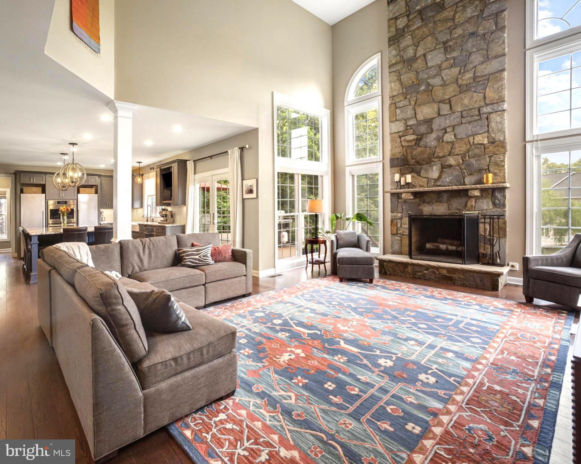 733 Seneca Drive Odenton, MD 21113 - Photo 10 of 83 a living room with furniture large window and a fireplace