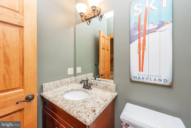 a bedroom with a large bed and a large window