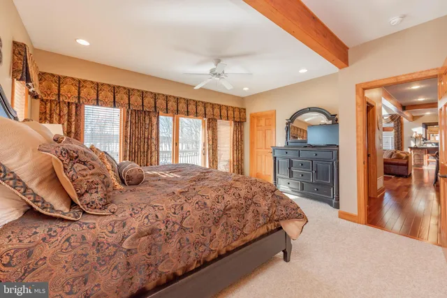 a bathroom with a bathtub and a toilet