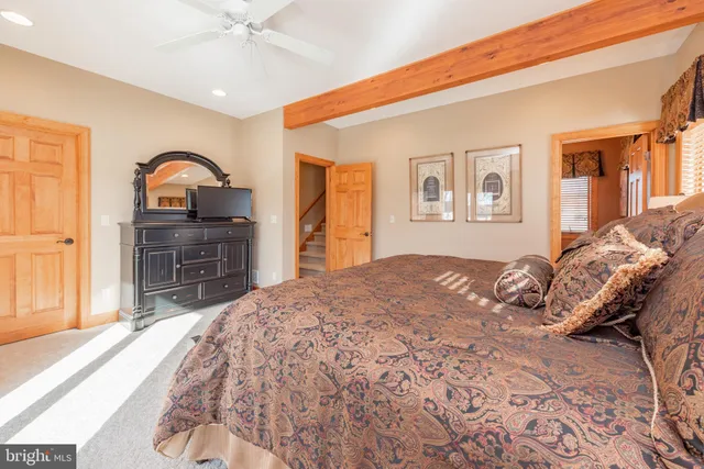 a white toilet sitting next to a small sink
