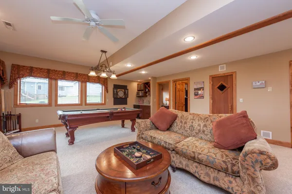 a view of a living room with dining room