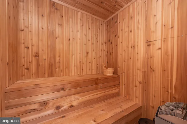 a view of a balcony with two chairs and a table