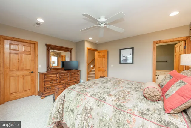 a view of a patio with a dining table and chairs