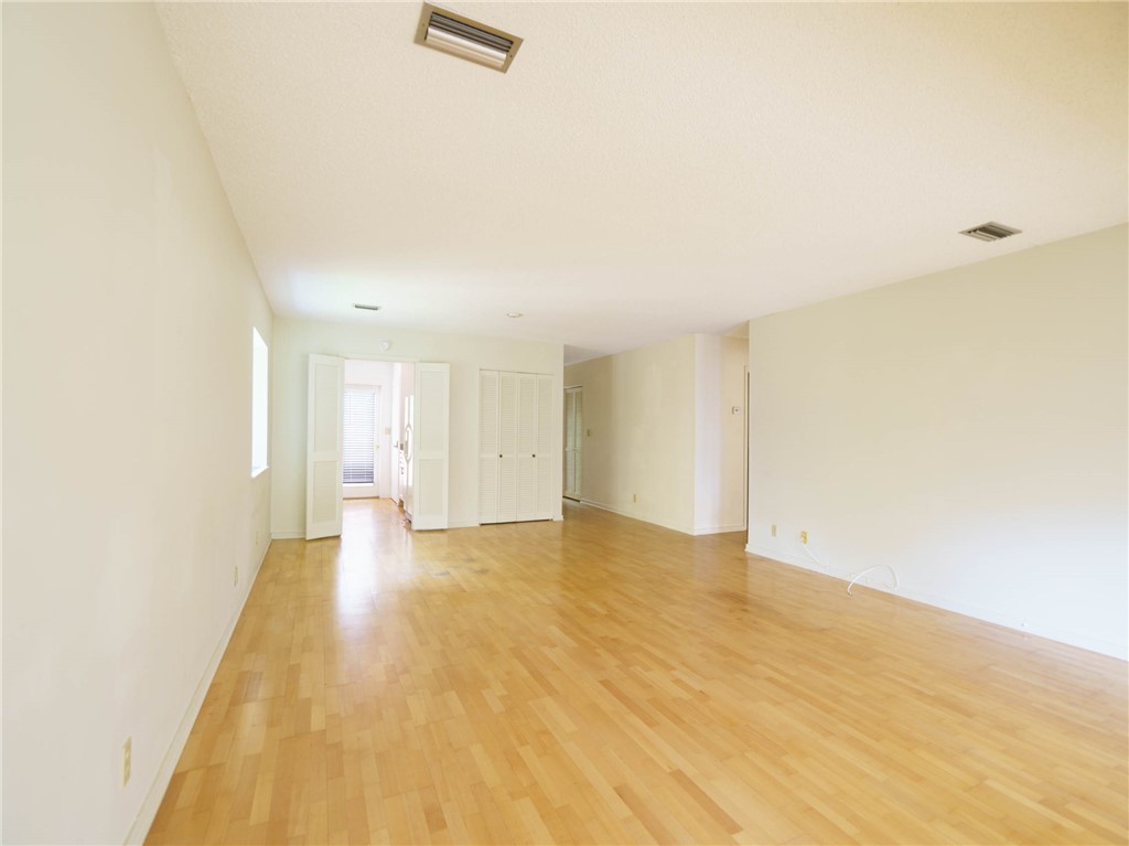 3309 Sea Marsh Road, Unit 3309 Fernandina Beach, FL 32034 - Photo 18 of 34 a view of an empty room and wooden floor